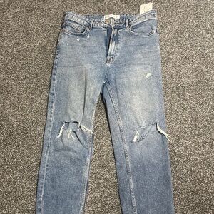 Distressed Blue Jeans